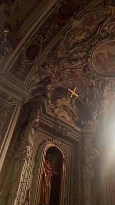 the interior of a church with paintings on the walls