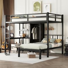 a black bunk bed sitting on top of a wooden floor next to a white rug