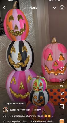 three pumpkins with faces painted on them