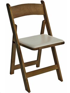 a wooden folding chair with white padded seat