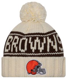 a brown and white beanie with the word browns on it, in front of a white