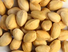 some nuts are laying on top of each other in a pile and ready to be eaten