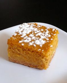 a piece of cake sitting on top of a white plate