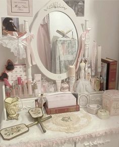 there is a vanity with many items on the table and in front of it, a mirror