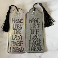 there lies the last page i read bookmarks with tassels on each one