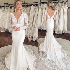 a woman standing in front of a wedding dress