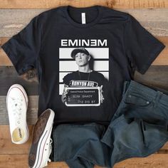 a t - shirt with the image of emiiem on it