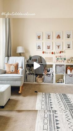 a living room filled with furniture and pictures on the wall