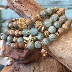 "Relax with this soothing fossil jasper and quartz 4-piece mala bracelet set with sandalwood and 18K gold-plated accents! Fossil Jasper instils a feeling of wholeness, serenity and being cared for, as well as aiding with mental clarity and functioning. As with all types of Jasper, it is known for inspiring a soothing sense of self-worth, warmth and joy. The stone allows the wearer to in-turn spread the feeling of warm sanctuary to others. Quartz brings balance into your life. Calms an overactive Types Of Jasper, Christmas Jewelry Diy, Vintage Jewelry Ideas, Diy Bracelets Tutorials, Mala Bracelet, Self Worth, Stretchy Bracelets, Jasper Beads, Bracelet Tutorial