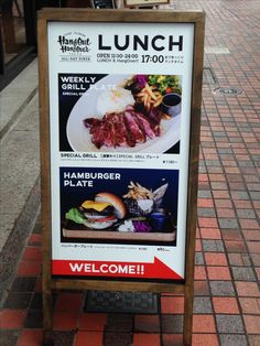 a sign on the sidewalk advertising lunch