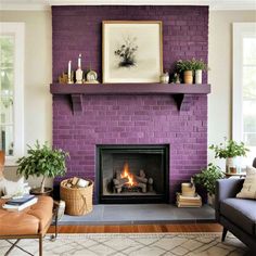 a living room filled with furniture and a fire place in front of a purple brick wall