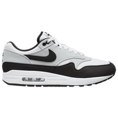 The One Simply put, the Men's Nike Air Max 1 is one of the most iconic sneakers of all time, and certainly also one of the most historic in Nike’s catalog. First released in 1987 as a performance running shoe, the Air Max 1 was designed by legendary Nike designer Tinker Hatfield and was the first sneaker ever to feature a visible window to expose the Air cushioning within the midsole. The shoe with “maximum Air” was an instant classic, loved in 1987 for its bold look and amazing comfort. As Nike Nike Sneakers For Men, Cool Nike Shoes, Air Max One, Iconic Sneakers, Black Nike Sneakers, Nike Sneakers Mens, Air Nike, Tinker Hatfield, Sneakers Nike Air Max