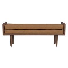 a brown bench sitting on top of a white wall next to a wooden legrest