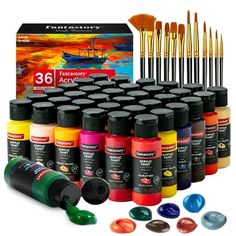 the paint set includes many different colors and brushes