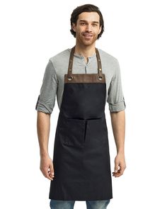 a man wearing an apron and smiling while standing in front of a white background with his hands on his hips