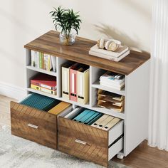 a book shelf with drawers and books on top