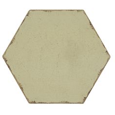 a white hexagonal tile on a white background