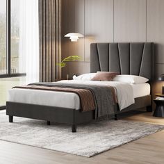 a bedroom with a bed, nightstands and lamps in it's center area