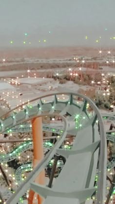 an aerial view of a city at night