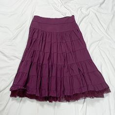 Vintage 2000s low rise skirt in purple. In good vintage condition. Note: I try to match colors as much as possible to pictures but there is a possibility it won't be an exact match. Unless the color is completely incorrect I am unable to offer refunds for this reason. Size: labeled "t5" fits like a large/extra large Brand is attentif Measurements (taken on garment laid flat): Waist: 35" Hips: 58" Length: 33.5" Fabric: not labeled Purple Stretch Tiered Skirt, Purple Cotton Tiered Skirt, Fall Shopping List, 2000s Low Rise, Skirt Grunge, Midi Skirt Vintage, Low Waist Skirt, Low Rise Skirt, Vintage Maxi Skirt