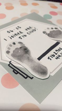 a close up of a paper with a foot print on it