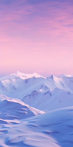 snow covered mountains under a pink sky with clouds in the foreground and blue skies above