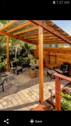 an outdoor patio with seating and pergolated area