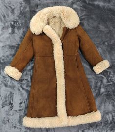 Extremely Rare True authentic vintage! 60's 70's Era The coat is without damage, no abrasions, no greasy stains and discoloration, a beautiful unique thing., There are some signs of wear that come with this piece having a past-life. Completley lined with shearling. Real lamb fur trim Big fluffy lamb fur collar Very good condition, slight signs of use. Dimensions: sleeve length from the collar: 73 c4 sleeve length from armpit: 43 cm in the bust: 2x 49 cm waist: 2x 47 cm in the hips: 2x 52 cm tota Vintage 70s Aesthetic, 60s Coat, Big Coat, Princess Coat, Sheepskin Coat, Penny Lane, Bohemian Hippie, Top Secret, Shearling Jacket