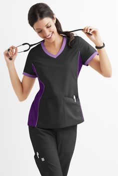 Get ready for compliments. Our women’s scrub top makes every day more “beautiful” with color block side panels and colorful contrast trim. The Butter-Soft scrub collection delivers you the durability you demand and the comfort you deserve in our signature lightly brushed easy-care fabric. Love it? New Style Arriving in Summer • Classic fit • Curved V-neck • Total of 4 pockets • 2 front pockets • 2 inside hidden pockets • Short sleeve • Front and back princess seams • Side vents • Approximate len Maternity Scrub Top, Med Couture Scrubs, Carhartt Scrubs, Wonderwink Scrubs, Maternity Scrubs