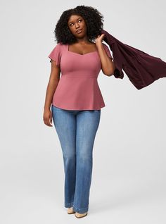 FIT Model is 5'10” wearing size 1. . Measures 28” from shoulder (size 2). MATERIALS + CARE Challis woven fabric: New, improved, and loved by all—and still lightweight, drapey, and (really! ) machine-washable. . Stretch level: None. . 82% rayon, 18% polyester. Machine wash cold. Line dry. Imported. DETAILS Sweetheart neckline. Short sleeves. Peplum detail. The best plus size women's peplum sweetheart top tops in wild ginger made of washchallis. Torrid is your destination for cozy fall and winter Torrid Outfits, Pear Shaped Outfits, Plus Size Peplum, Short Sleeve Top, Sweetheart Neckline, Plus Size Fashion, Woven Fabric, Plus Size Outfits, Short Sleeves Tops