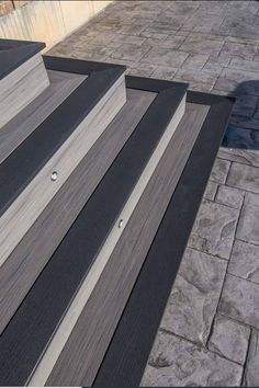 several different types of wooden boards on the ground