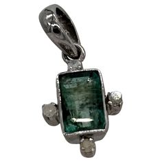 This Stunner Pendant defines class. It completes your everyday look and will also attract special attention on special occasions. This piece of beauty comprises of Certified Natural Zambian Emerald studded in 925 Sterling Silver with Certified Pave diamonds for subtle look. Details are here below: Pendant Size. 25 x 11 mm Metal- Sterling Silver Metal purity- 92.5% Gross Wt.-1.880grm Hallmarked- Yes Gemstone- Emerald (Natural) Origin- Zambia Diamond type- pave diamonds Diamond count- 4 Diamond co White Diamond Necklace, Art Nouveau Pendant, Coral Pendant, Zambian Emerald, Emerald Pendant, Modern Necklaces, Beaded Choker Necklace, Zambia, Natural Emerald