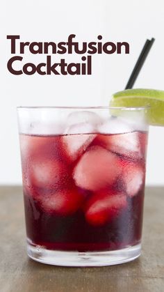 a close up of a drink in a glass on a table