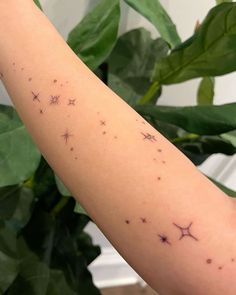 the arm is covered with small stars on it