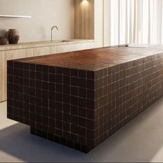 a kitchen with a counter top made out of bricks