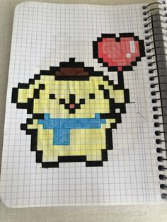 a notebook with an image of a pikachu holding a red apple on it