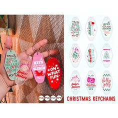 christmas keychains are being held up by someone's hand with the words kits and stuff on them