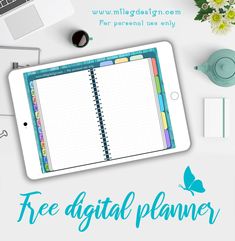 the free digital planner is displayed on top of a desk with flowers and notebooks