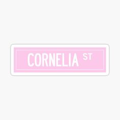 a pink sticker with the word cornella st on it