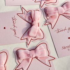 pink bows and thank you notes on white paper