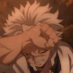 an anime character with his fist raised in the air