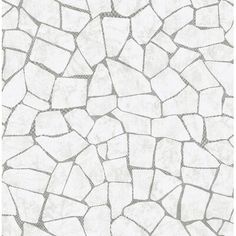 a white and gray tile wallpaper with small rocks on it's sides,