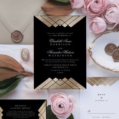 wedding stationery with pink flowers and gold foil on black paper, including an envelope