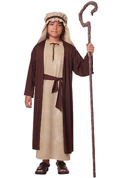 a young boy dressed in biblical clothing holding an old fashioned stick and wearing a brown robe