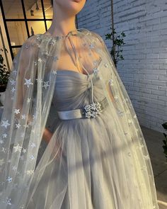 Shining Star Capelet Gown Teuta Matoshi Dresses, Matoshi Dress, White And Silver Dress, Celestial Dress, Teuta Matoshi, Grey Wedding Dress, Grey Gown, Silver Gown, Draped Bodice