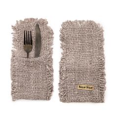 a fork and knife in a pair of mitts