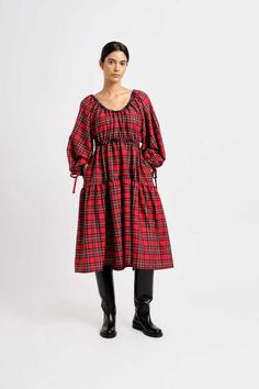 The josie dress is an elegant classic tiered dress that will surely become a wardrobe essential. this red and blue plaid dress features an elastic waist and ethereal puff sleeves with bow tie cuffs providing a sophisticated silhouette without compromising comfort. as easy to wear as a nightgown yet as sturdy as work wear...you will never stop wearing this one!    - 65% polyester 35% rayon    - slips on over head    - has pockets    - elasticized waistband    - made in canda Blue Plaid Dress, Long Red Dress, Plaid Dress, Tiered Dress, Dress Red, Red Plaid, Blue Plaid, Puff Sleeves, Cotton Dresses