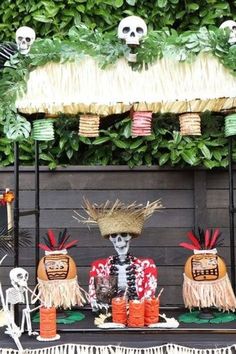 a table topped with lots of halloween decorations