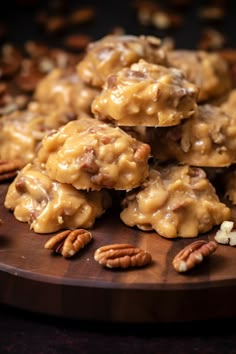 some pecan cookies are stacked on top of each other and ready to be eaten