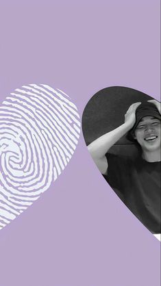 a woman holding her head next to a fingerprint heart